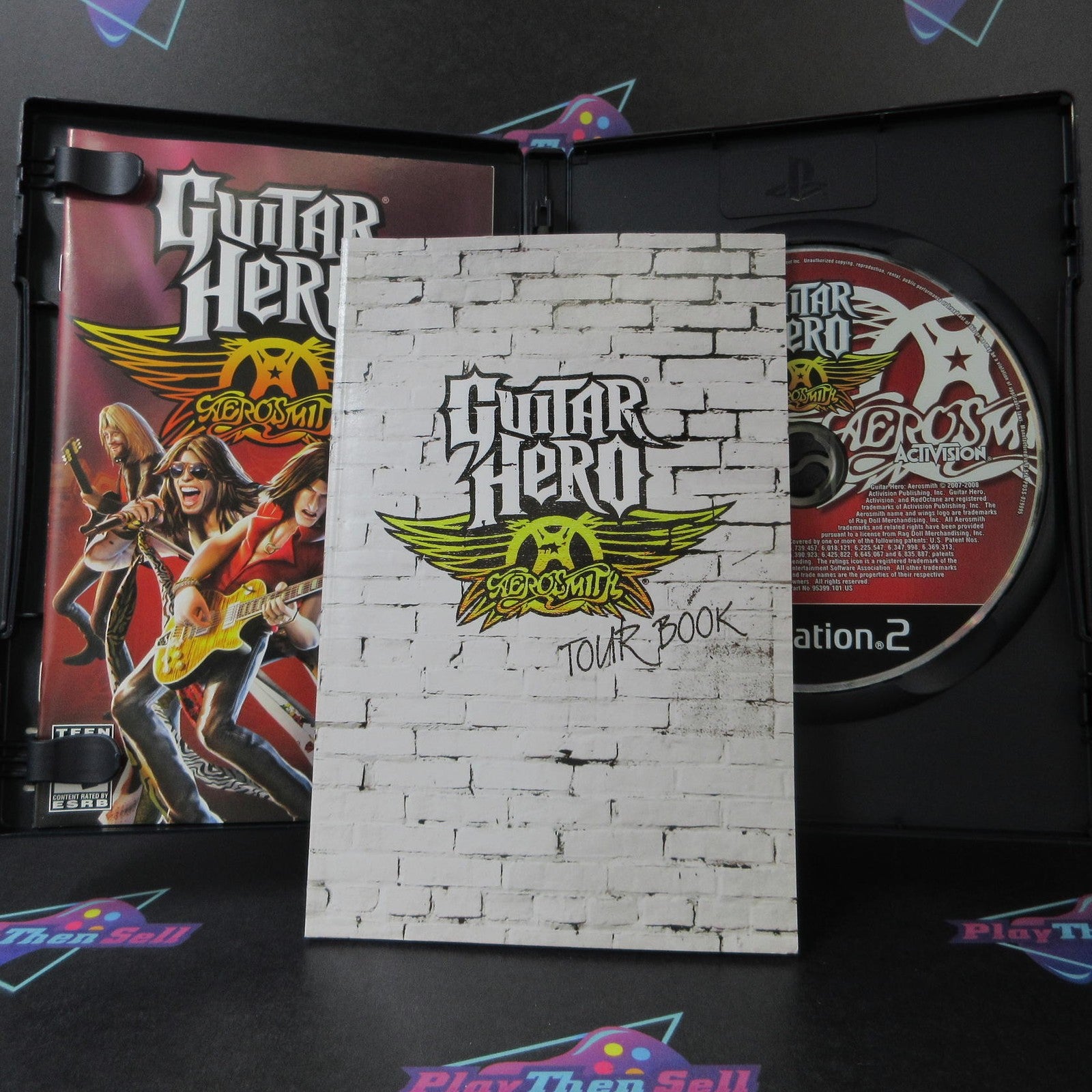 Guitar Hero Aerosmith PS2 PlayStation 2 + Tour Book Complete  - 1 Year Warrant..
