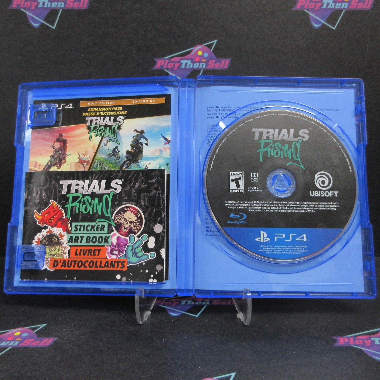 Trials Rising Gold Edition PS4 PlayStation 4 + Sticker Book Complete  - 1 Year..
